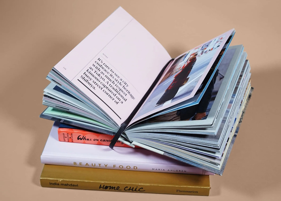 128gsm 140gsm 157gsm หนังสือปกแข็งสุดหรูการพิมพ์ Art Coffee Table Photo Book