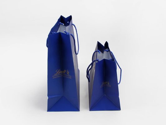 C1S C2S ถุงกระดาษส่วนบุคคลเคลือบมัน Sea Blue Garment Shopping Paper Bags