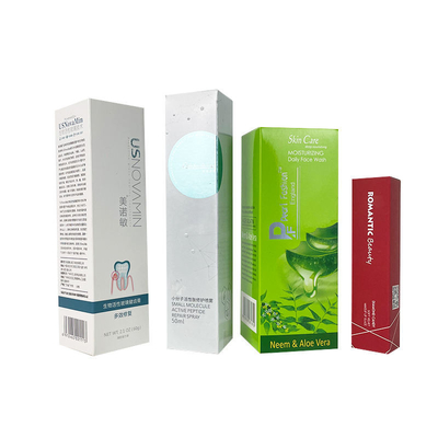 กล่องกระดาษแข็งพับได้สีขาว OEM กล่องกระดาษเครื่องสำอาง UV จุด